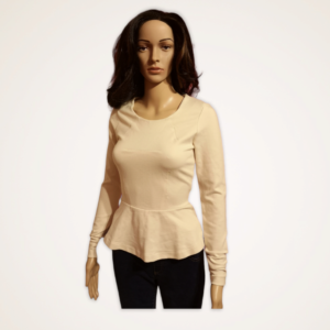 Model wear French Connection peplum top in cream